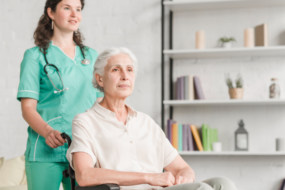 female caregiver assisting disable senior woman for a seniors care services